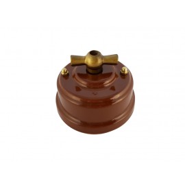 Выключатель (переключатель) фарфоровый поворотный одноклавишный проходной, цвет bruno (коричневый), ручка бронза 