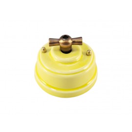 Выключатель (переключатель) фарфоровый поворотный одноклавишный проходной, цвет giallo (желтый), ручка бронза 